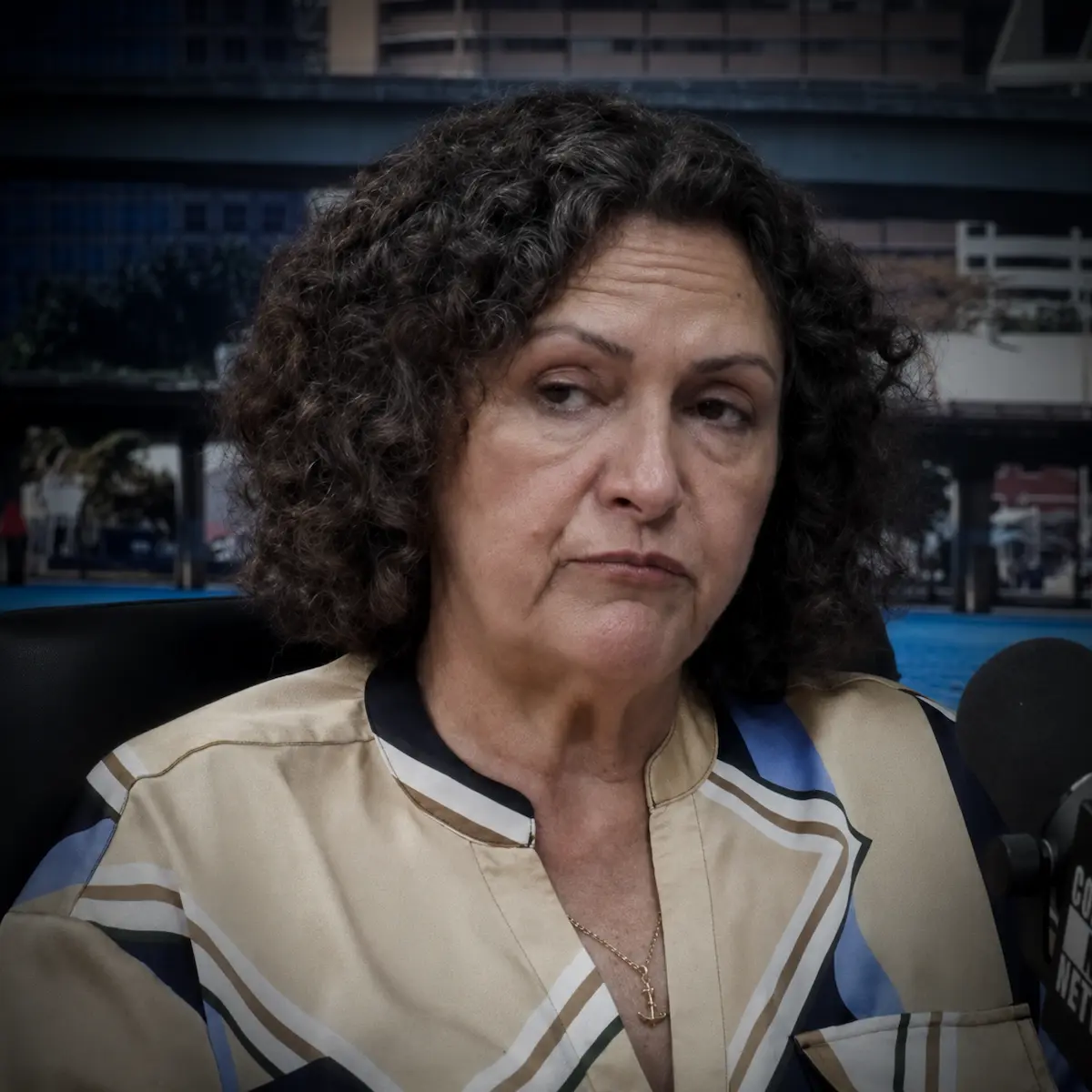 Front-facing portrait of Judge Mavel Ruiz during a podcast interview.